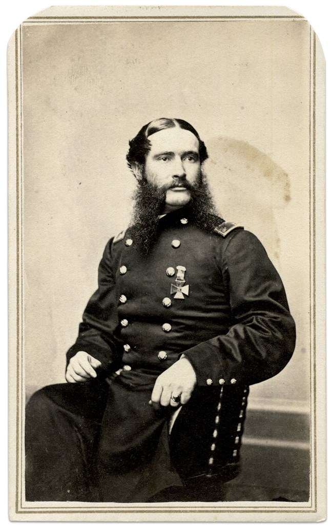 Black and white photograph of seated Union Civil War officer.