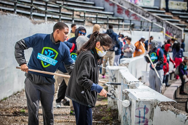 HOPE Volunteers painting at Hinchliffe Stadium.