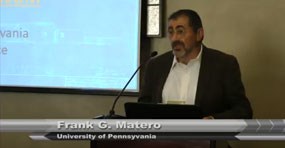 man at podium, bottom ribbon reads "Frank Matero: University of Pennsylvania"