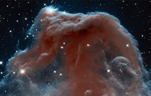 Horsehead Nebula Photo courtesy of NASA Deep space photograph of a blue, white, and red nebula