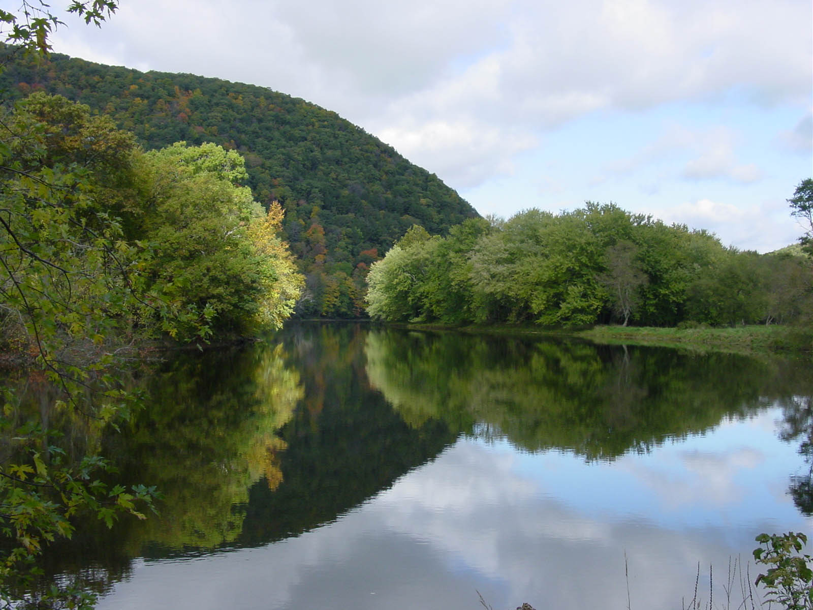 Housatonic River A flat, calm view of the Housatonic River in early fall