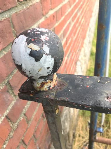 a knob with peeling paint