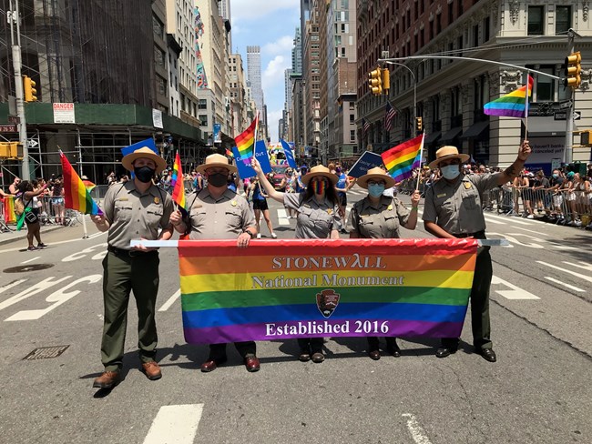 Five Rangers marching in Pride during the Covid-19 Pandemic