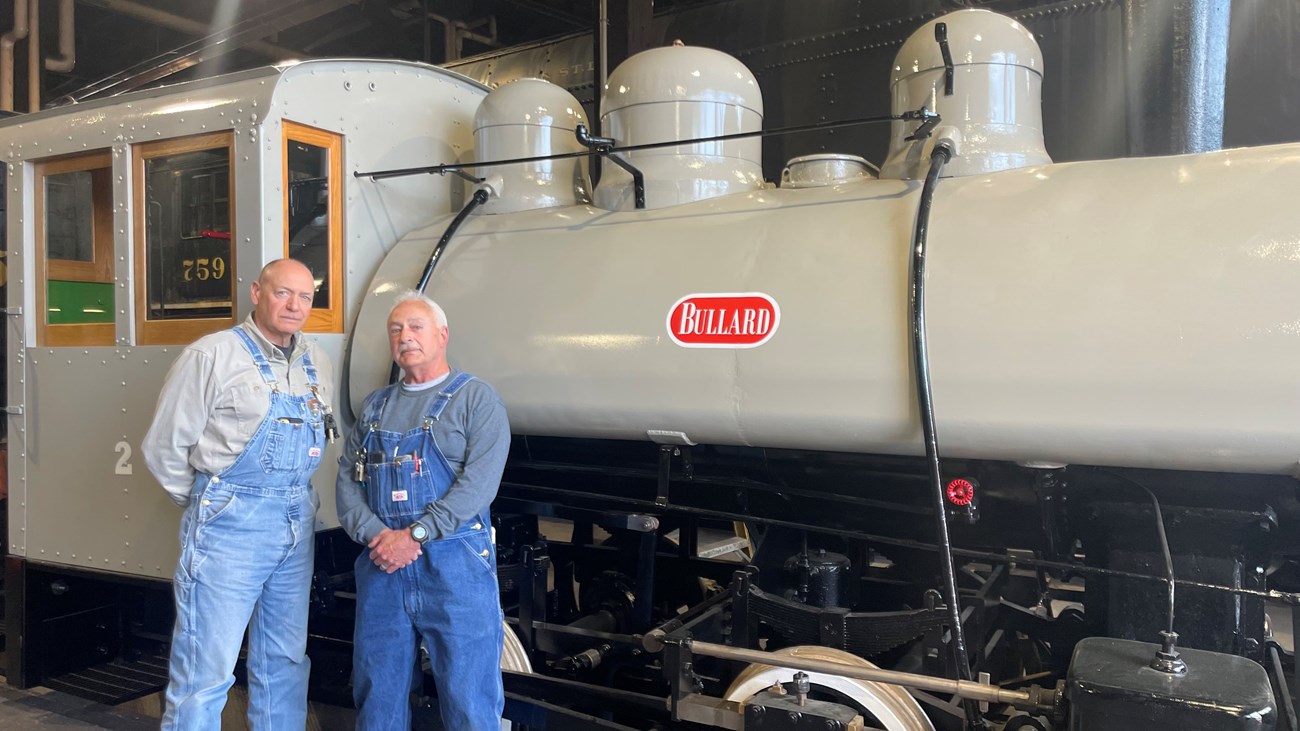 Jack D'Apice and John Bibalo standing next to Bullard No 2 Jack D'Apice and John Bibalo standing next to Bullard No 2