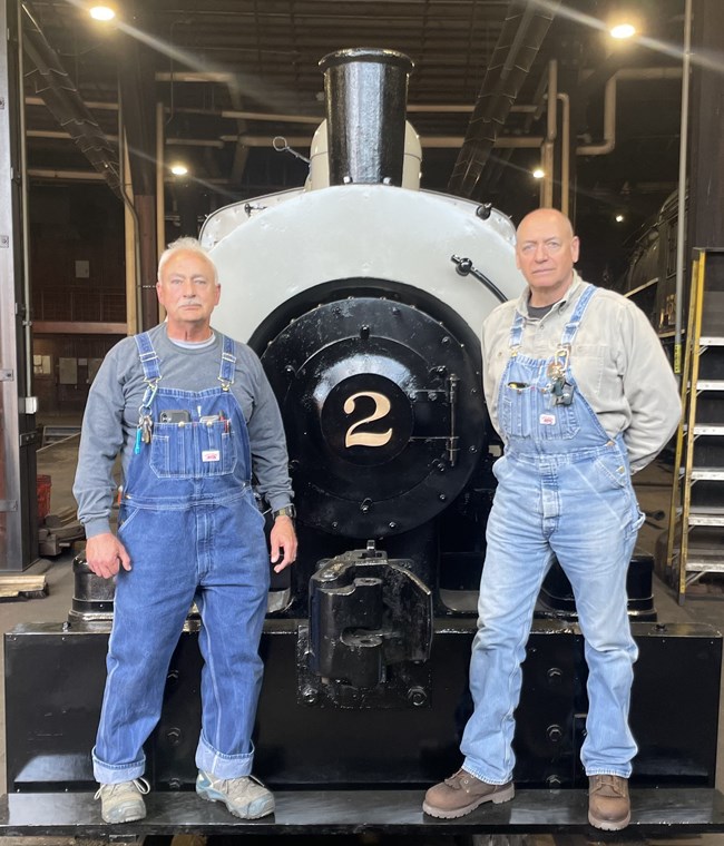 Jack and John posing in front of the engine. Jack and John posing in front of the engine.