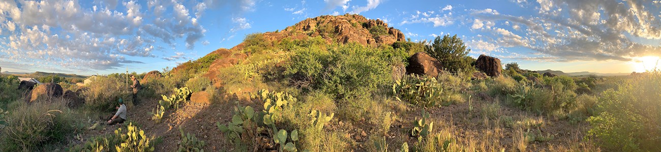 a desert landscape at sunrise