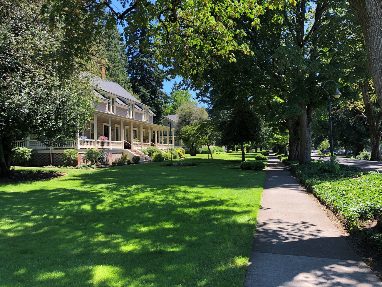 A photo of Officers' Row in Vancouver Barracks on a sunny day.