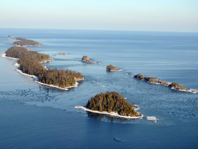 Tookers and Shaw Islands chain of islands dotting blue Lake Superior