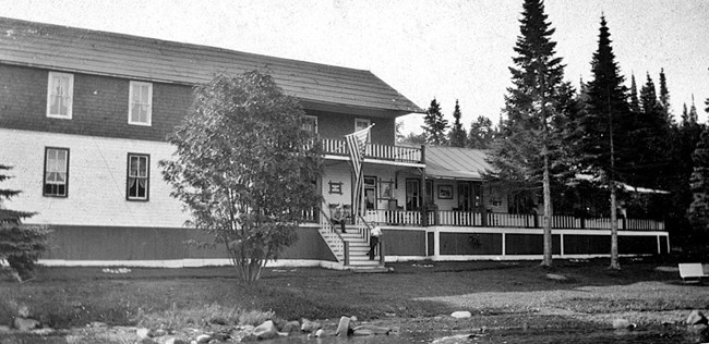 two story resort, long front porch on right