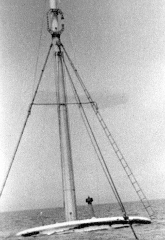 mast of the SS Emperor rising out of the water near Canoe Rocks
