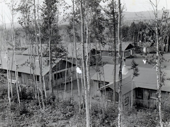 rectangular, wood sided buildings of CCC camp at Siskiwit Bay