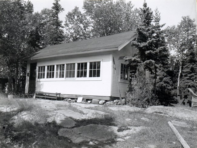 rectangular cabin with many large windows