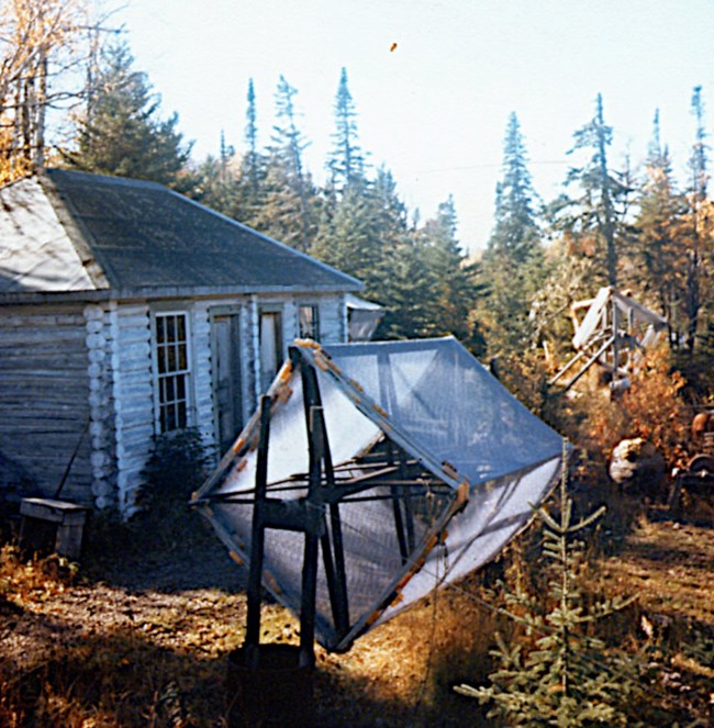gill nets hanging in front of cabin