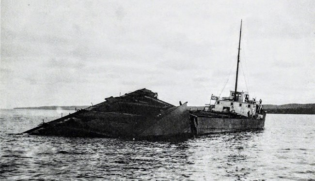 SS Chester A. Congdon, grounded on Canoe Rocks, pilot house above water, view from stern side
