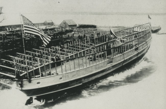 steamship making its first entrance into the water with a splash