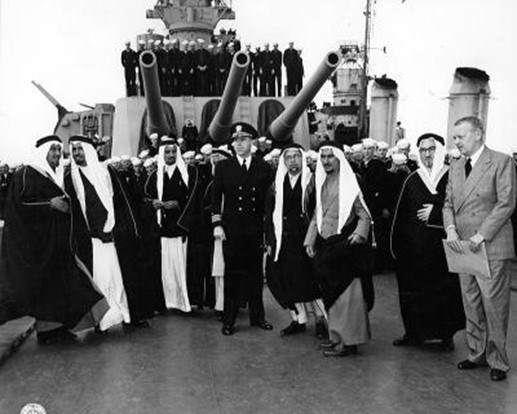 A group of Arabs, Naval Officers, and Diplomats aboard the USS Quincy
