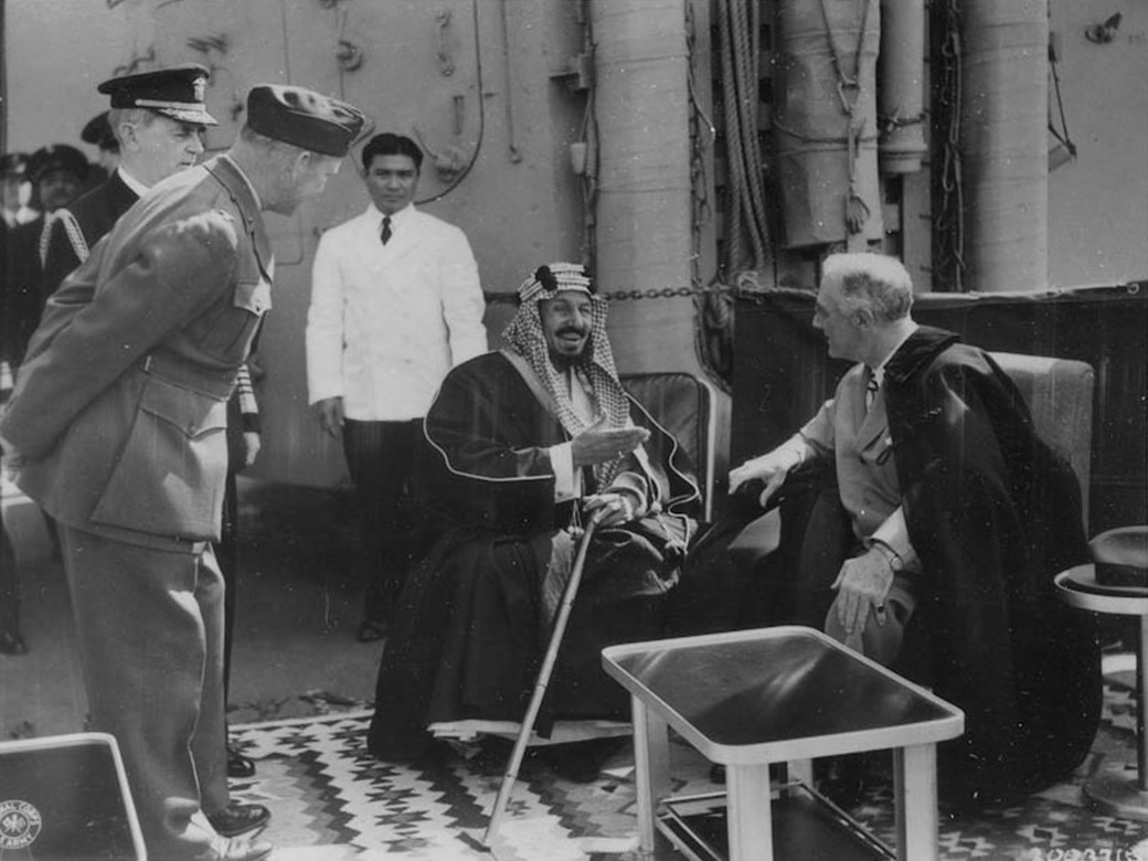 Ibn Saud and FDR seated together aboard the USS Quincy