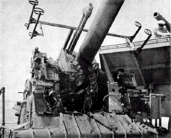 Shell damage on RALPH TALBOT's Number Four gun following the Battle of Savo Island.