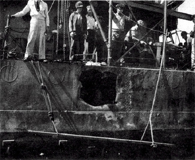 Shell hole on starboard (right) side of USS RALPH TALBOT after the Battle of Savo Island. Shell hole on starboard (right) side of USS RALPH TALBOT after the Battle of Savo Island.