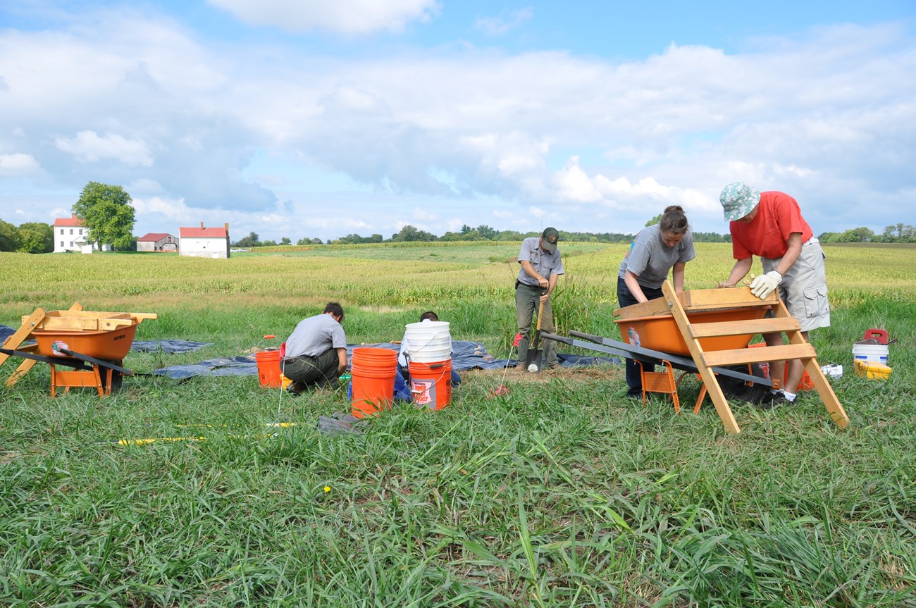 Archeologists in excavation