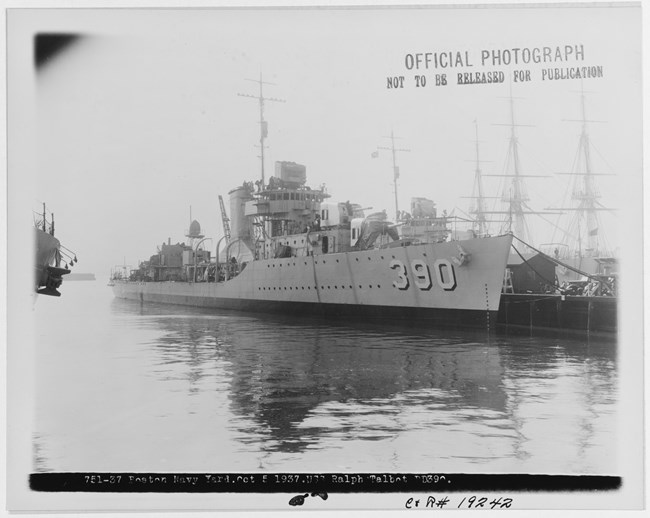 USS RALPH TALBOT in the Boston Navy Yard on October 5th, 1937. Visible in the background are the masts of what likely is the USS CONSTITUTION.