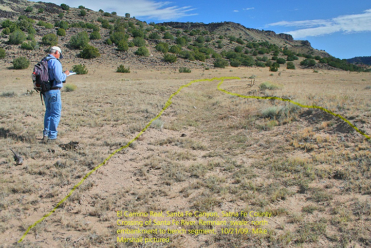 An archeologist records a swale of El Camino Real (outlined in yellow) An archeologist records a swale of El Camino Real (outlined in yellow) in 2009.