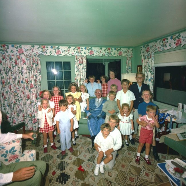 Rose and Joe (seated) surrounded by grandchildren