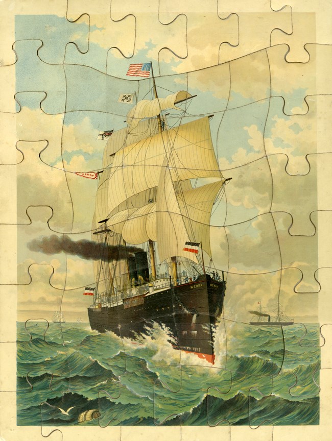 Puzzle with image of steamship with sails on ocean