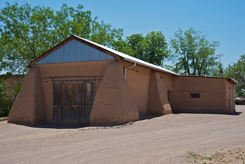 Rambling adobe barns highlighting traditional architectural styles dot the Mesilla Historic District as a reminder of Mesilla's deep agricultural roots. Photo © Jack Parsons