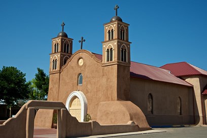 Adobe church with bell towers.