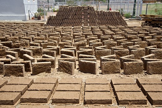 Freshly made adobe bricks will be put to use in construction at the historic Lujan Store in the heart of the San Elizario Historic District in West Texas.
Photo © Jack Parsons.