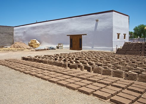 Ongoing restoration efforts by San Elizario residents and town leaders, such as this work at the late-19th-century Lujan Store on Main Street, help ensure the architectural integrity of the town’s historic district.