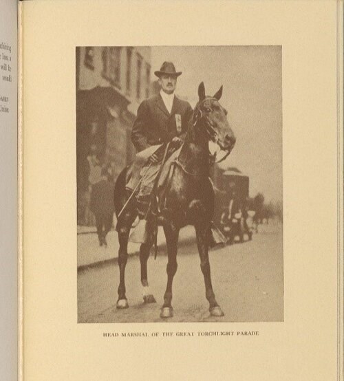 James+Lees+Laidlaw+as+Head+Marshal+in+the+Torchlight+Parade+of+1912.+%28Courtesy+of+Schlesinger+Library A man in a black suit and hat sits on a black horse (black and white photo) Schlesinger Library