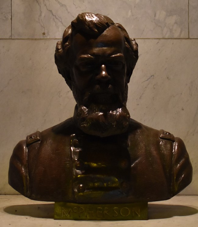 Bronze statue of a man's head