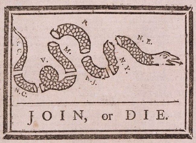 Join or Die print by Benjamin Franklin of a snake divided up into the different colonies.
