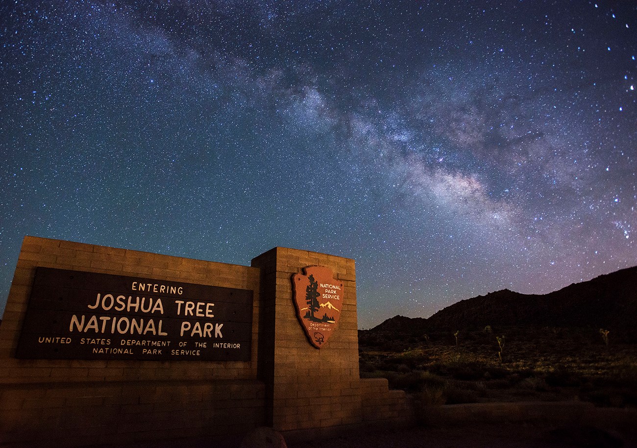 Joshua Tree National Park entrance sign with Milky Way Joshua Tree National Park entrance sign with Milky Way