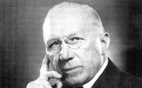 Judge Lewis Head shot of Judge Lewis facing front with his hand on his chin.