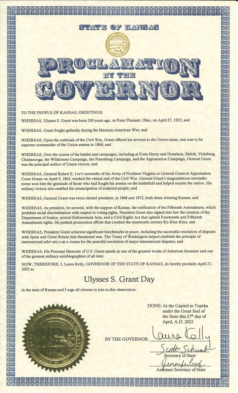 Paper with proclamation from Kansas regarding Grant's 200th Birthday. The golden seal of Kansas is fixed in the bottom left