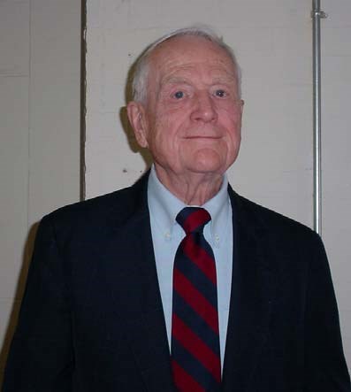 an older white man in a suit