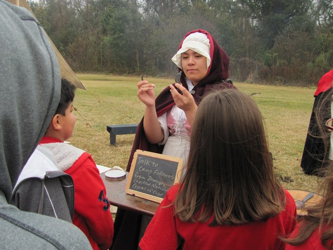 Kim Samaniego during a living history event at Chalmette Battlefield.