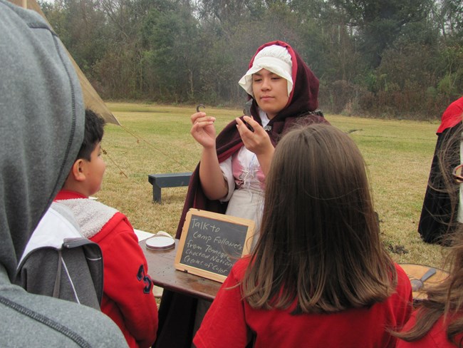 Kim Samaniego during a living history event at Chalmette Battlefield. Kim Samaniego during a living history event at Chalmette Battlefield.