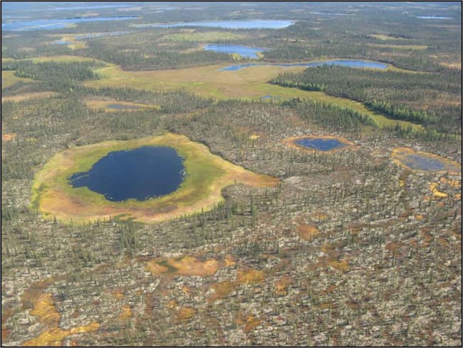 Aerial views of lakes in boreal forest.