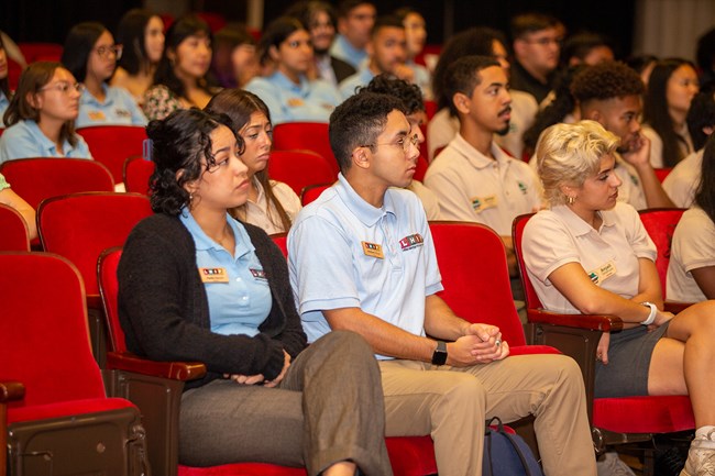 Group of interns from the Latino Heritage Internship Program and Mosaics in Science Diversity Internship Program listening to a speaker