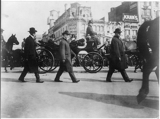 Theodore Roosevelt in a carriage on Pennsylvania Avenue en route Capitol, March 4, 1905, Library of Congress President Theodore Roosevelt rides in a horse-drawn carriage during his inaugural procession to the Capitol. The carriage is surrounded by men in hats on foot and horseback.