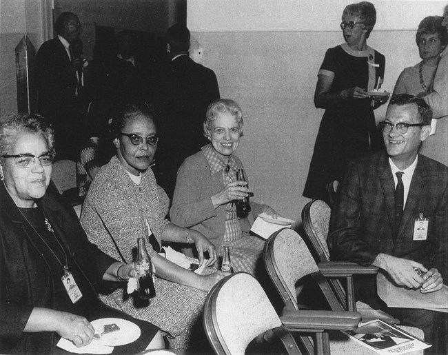 Group of women sitting together.