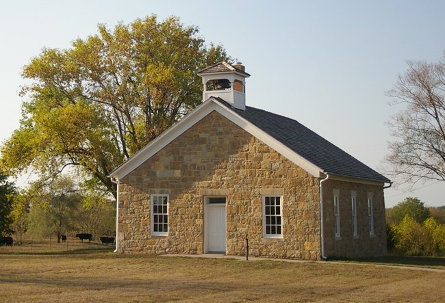 A picture of a one room schoolhouse.
