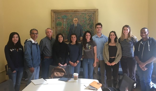 Dr. Gonzalez (second from left) and Mr. Jonathan Jarvis (third from left), the 18th Director of the National Park Service, with a cohort of UC Berkeley students. Group of people gathered for a photo.