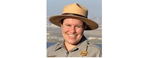 Lauren Pandori Smiling woman in NPS uniform and hat