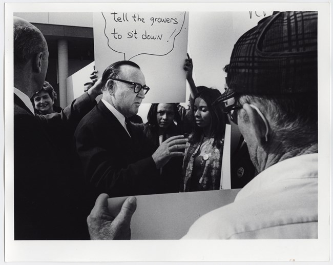 Picketers and volunteers address Governor Edmund Gerald "Pat" Brown, Sr. in Bakersfield, California.