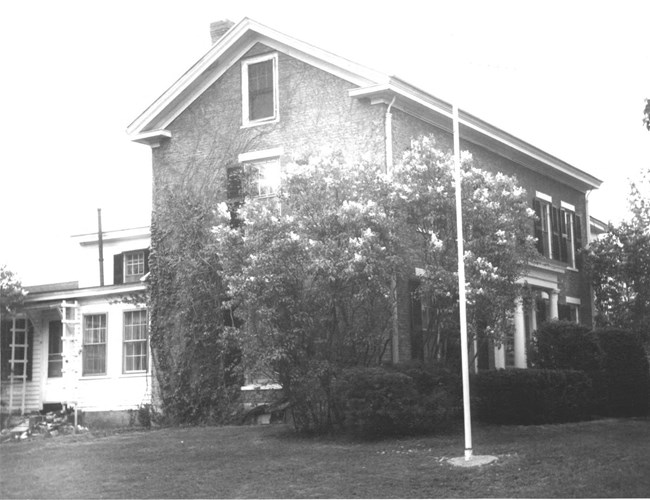 Two-story farm house.